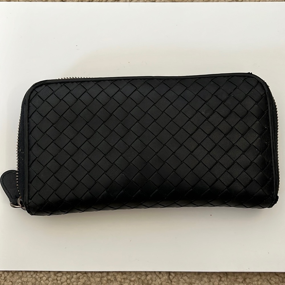 Bottega Veneta navy zip around wallet.